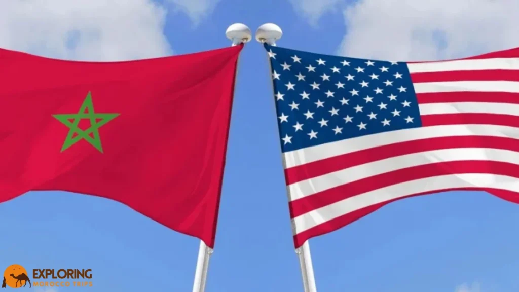 Flags of Morocco and the United States flying side by side, symbolizing strong ties and the ease of traveling to Morocco from USA.